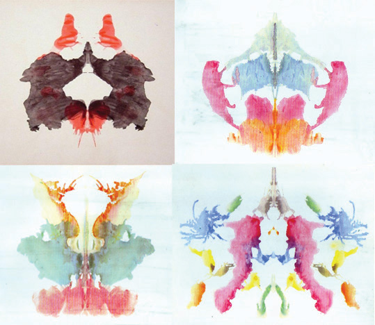 These pictures show four examples of Rorschach inkblot tests.