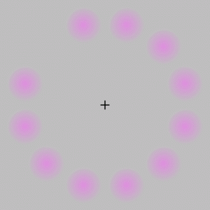 This animated graphic shows pink dots on a grey background, which appear and disappear in a predetermined sequence, giving the illusion of movement.