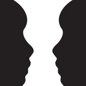 This digital image illustrates an optical illusion, containing either two faces looking at each other or a vase in white at the centre.